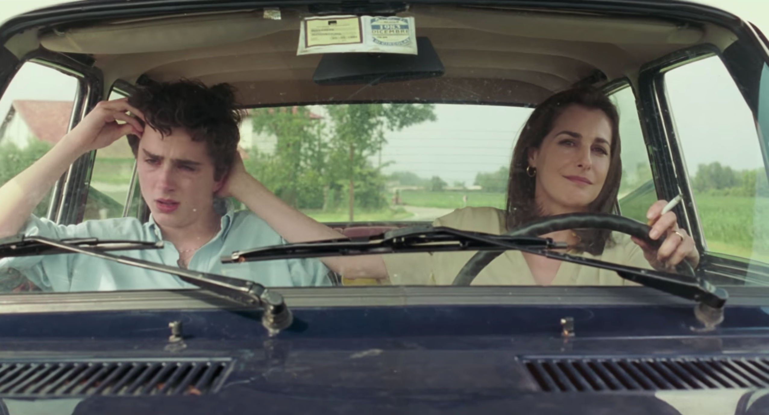 Elio and his mother driving home from the train station